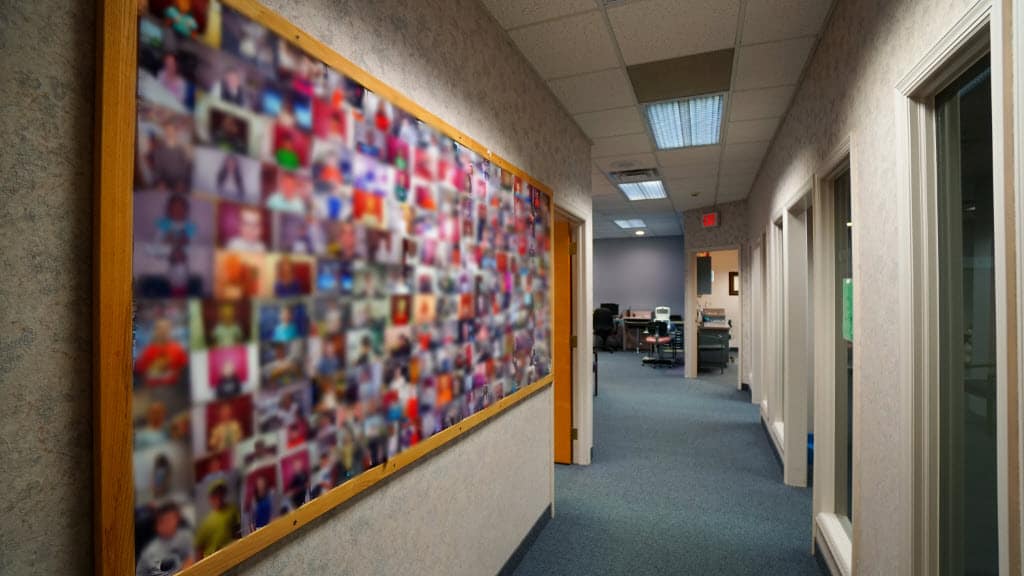 PressVision hallway with a large colorful photo display